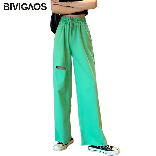 Nowoczesne damskie spodnie capri BIVIGAOS 2020 z wysokim stanem, dziurą i szerokimi nogawkami. Wykonane z bawełny i idealne na codzienne, luźne stylizacje - tanie ubrania i akcesoria