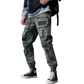 Męskie spodnie cargo z bocznymi kieszeniami i jednolitą fakturą, streetwear, dla biegaczy i miłośników hip-hopu, wykonane z bawełny