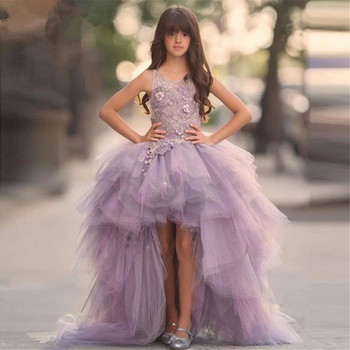 Piękne sukienki dla dziewczynek z aplikacją fioletowego kwiatka, koronką i kokardkami