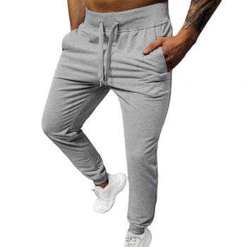 2021 Męskie spodnie dresowe jednokolorowe, proste, Oversize z kieszeniami, ciepłe, pasujące na jesień